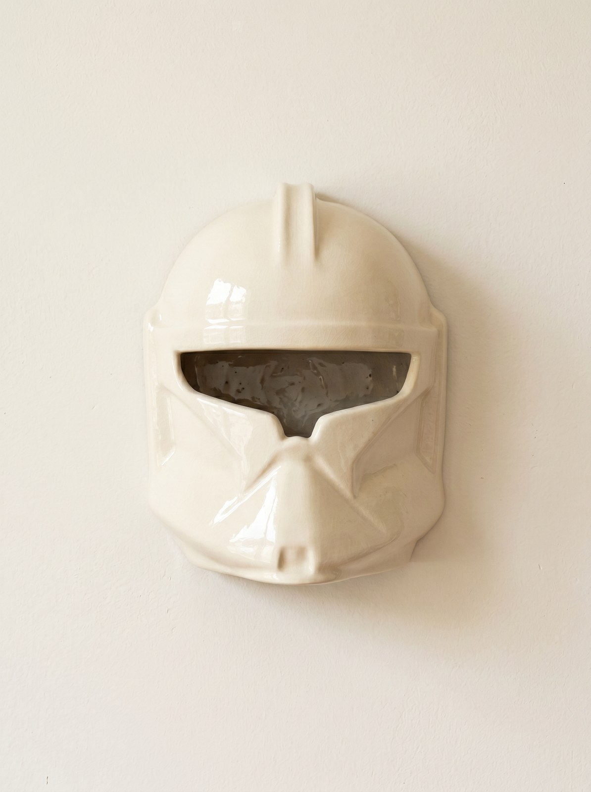 Cream ceramic mask with blue splatter