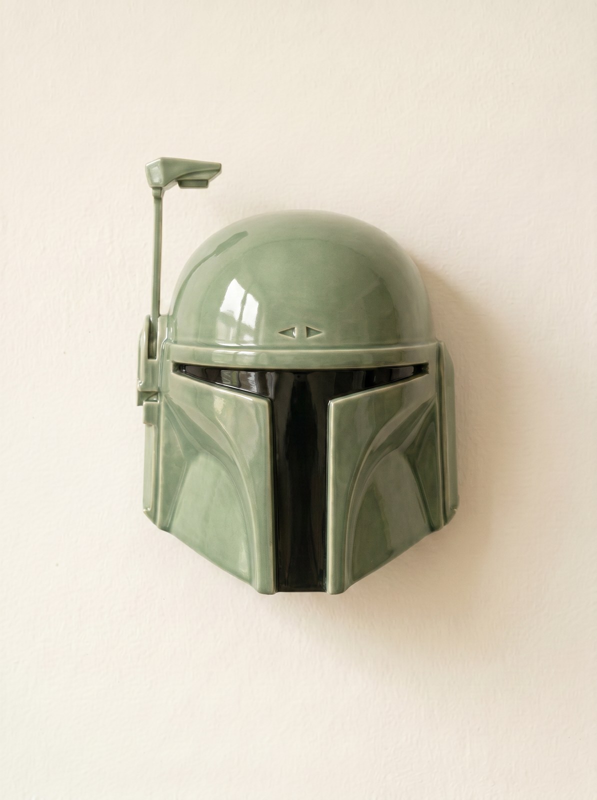 Boba Fett ceramic wall mask in gloss sage green