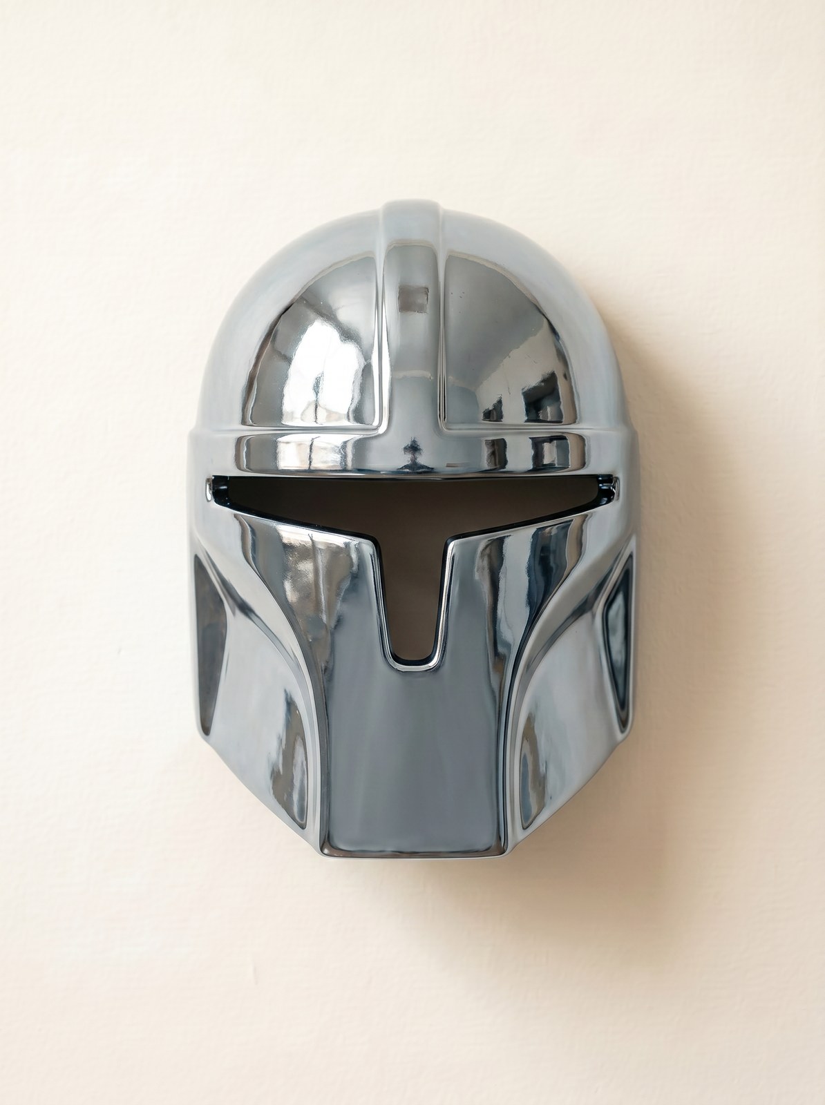 Mando ceramic wall mask in polished silver chrome