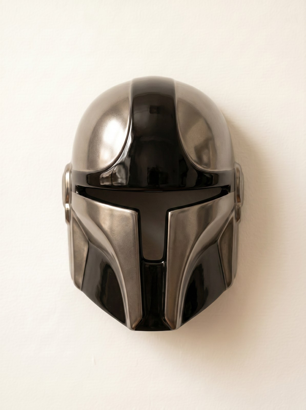 Mando ceramic wall mask in black and titanium grey
