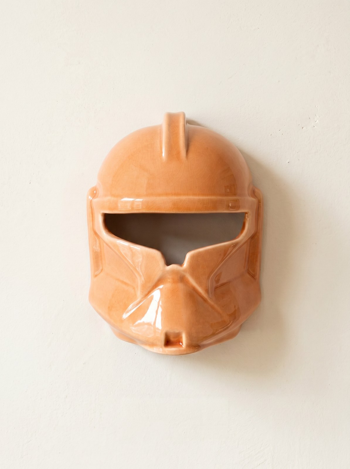 Orange crazed ceramic mask