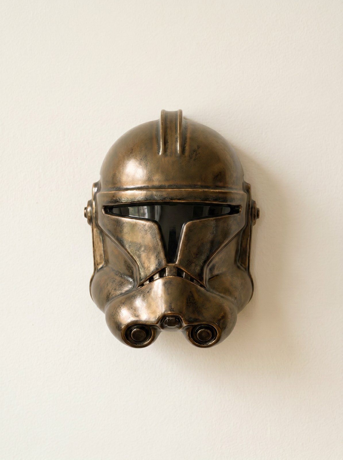 Rex ceramic wall mask in bronze